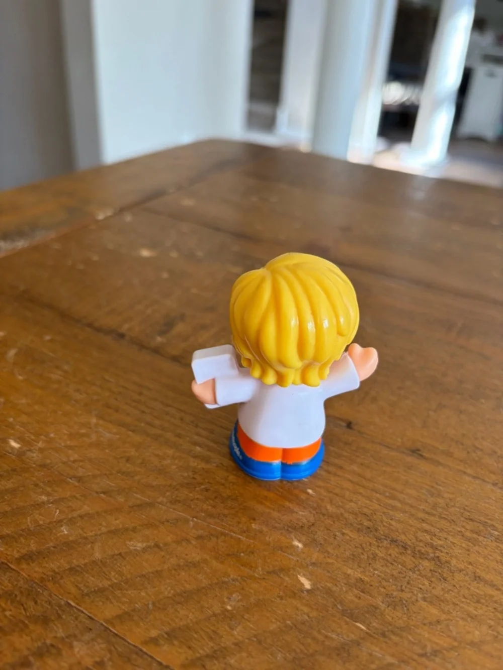 Fisher Price Little People Eddie with dinosaur book as is